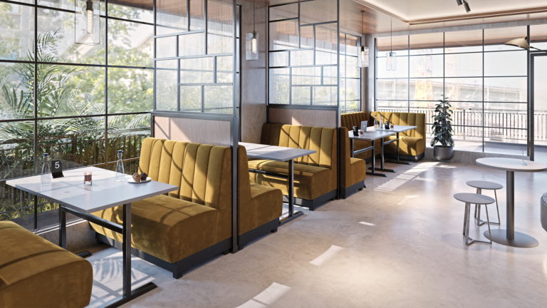 Musztardowe loże Paris ustawione w boksy z przegrodami, przy oknach przeszklonej sali restauracyjnej